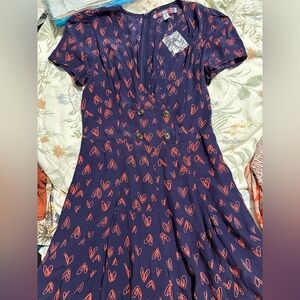 Adorable Urban Outfitters Blue Skort Jumpsuit with Red Heart Motif